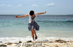Carefree in Bonaire - my daughter getting her feet wet at... by Alan Lyall 